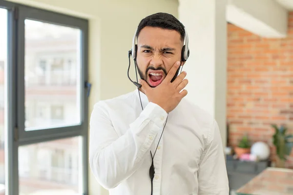 Young Adult Man Mouth Eyes Wide Open Hand Chin Telemarketer — Stock Photo, Image