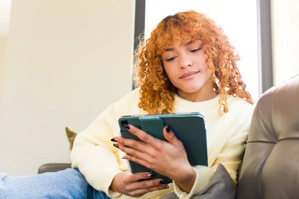 Young Red Hair Latin Pretty Woman Using Touchscreen Pad Home — Fotografia de Stock