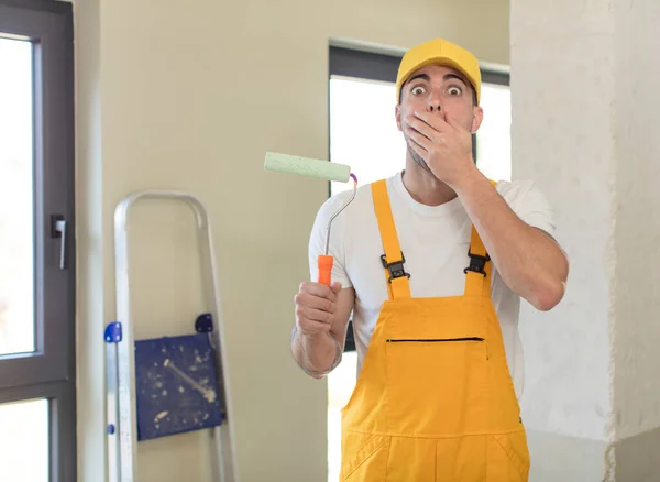 Young Handsome Man Covering Mouth Hand Shocked Surprised Expression Painting — Stock Photo, Image