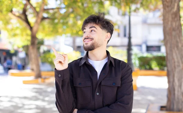 Young Handsome Man Smiling Happily Looking Sideways Wondering Thinking Having — Stock Photo, Image