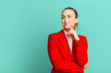 young pretty businesswoman wearing red blazer