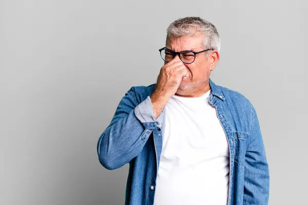Middle Age Senior Man Feeling Disgusted Holding Nose Avoid Smelling — Stock Photo, Image