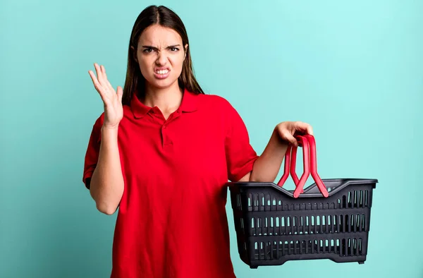 Young Pretty Woman Screaming Hands Air Empty Shopping Basket Concept — Stok fotoğraf