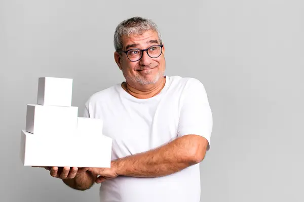 Middle Age Senior Man Shrugging Feeling Confused Uncertain Different Packages — Stock Photo, Image