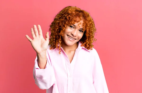 Redhair Pretty Woman Smiling Happily Cheerfully Waving Hand Welcoming Greeting — Stockfoto