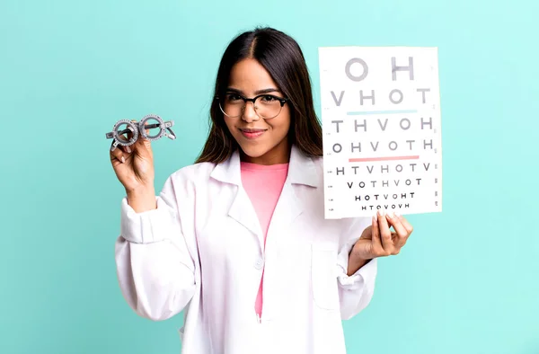 Hispanic Pretty Young Adult Woman Optical Vision Test Concept — Fotografia de Stock
