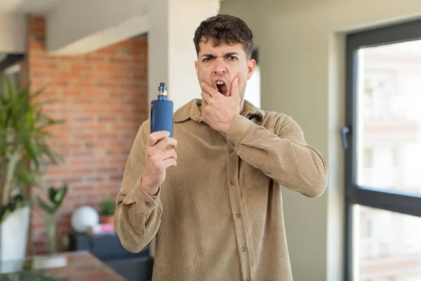 Young Handsome Man Mouth Eyes Wide Open Hand Chin Vaper — Stock Photo, Image