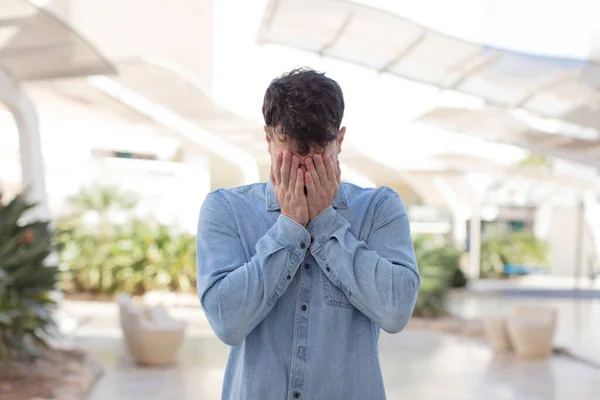 Young Handsome Man Feeling Sad Frustrated Nervous Depressed Covering Face — Stock Photo, Image