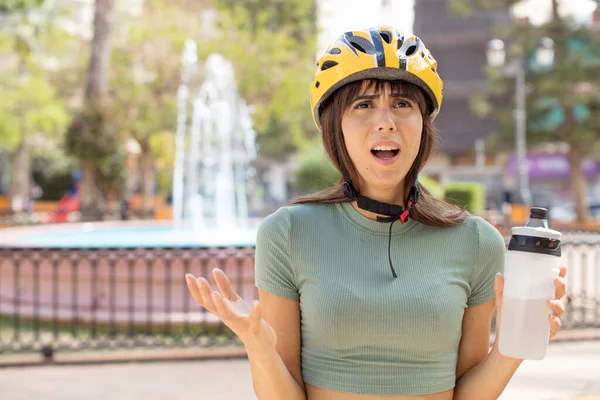 Young Pretty Woman Screaming Hands Air Bike Helmet Concept — Stok fotoğraf