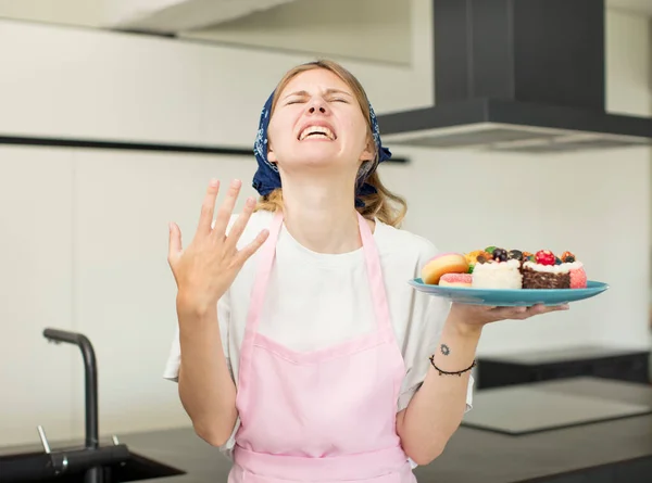 Young Pretty Woman Screaming Hands Air Home Made Cakes Concept — Stockfoto