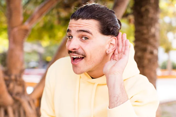 Young Cool Man Looking Happy Listening Trying Hear Secret Conversation — Stock Photo, Image