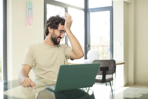 Young Adult Bearded Man Laptop Laughing Slapping Forehead Saying Doh — Stock Photo, Image