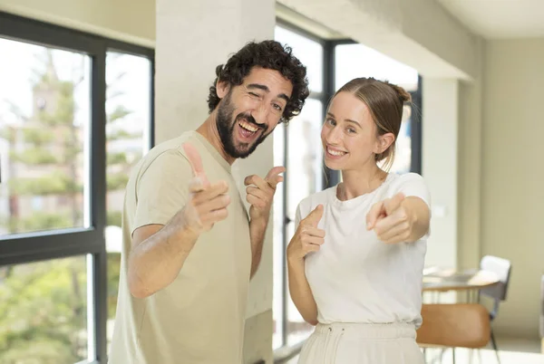 Young Adult Couple Feeling Happy Cool Satisfied Relaxed Successful Pointing — Stock Photo, Image