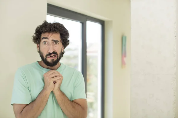 Young Crazy Bearded Man Looking Worried Stressed Anxious Scared Panicking — Stock Photo, Image