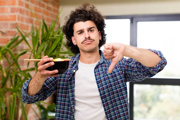 Young Handsome Man Chinese Ramen Noodles Bowl Home Interior — Stock Photo, Image