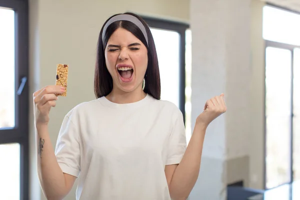 Pretty Young Woman Looking Angry Annoyed Frustrated Fitness Cereal Bar — Stock Photo, Image