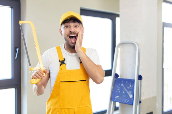 Young Handsome Man Feeling Happy Astonished Something Unbelievable Handyman Saw — Stock Photo, Image