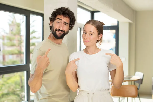 Young Adult Couple Looking Proud Arrogant Happy Surprised Satisfied Pointing — Stock Photo, Image