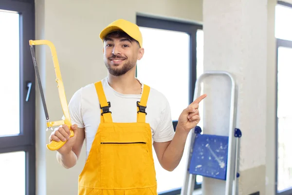 Young Handsome Man Smiling Cheerfully Feeling Happy Pointing Side Handyman — Stock Photo, Image