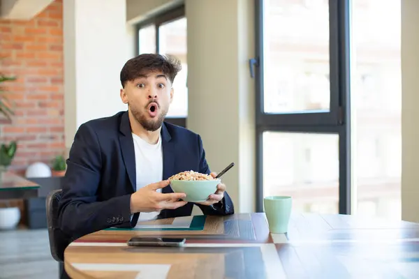 Young Handsome Man Feeling Extremely Shocked Surprised Breakfast Concept — Stock Photo, Image