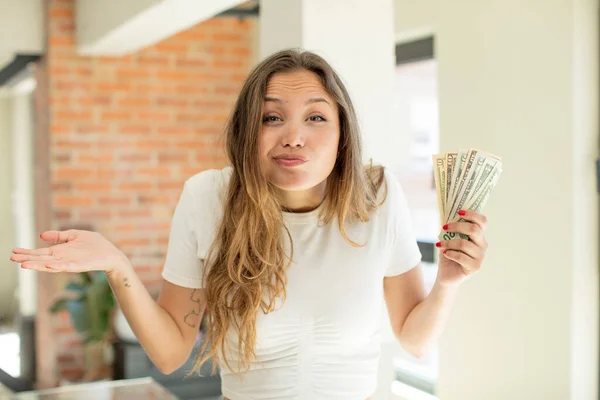 Pretty Woman Shrugging Feeling Confused Uncertain Dollar Banknotes Concept — Foto Stock