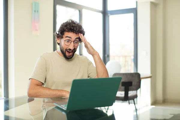 Young Adult Bearded Man Laptop Looking Happy Astonished Surprised Smiling — Stock Photo, Image