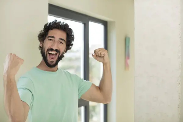 Young Crazy Bearded Man Feeling Happy Satisfied Powerful Flexing Fit — Stock Photo, Image