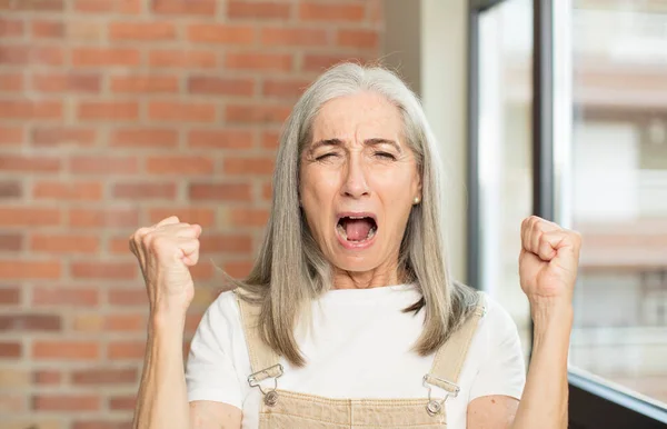 Senior Pretty Woman Shouting Aggressively Angry Expression Fists Clenched Celebrating — Stock Photo, Image