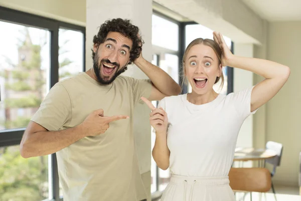 Young Adult Couple Laughing Looking Happy Positive Surprised Realizing Great — Stock Photo, Image