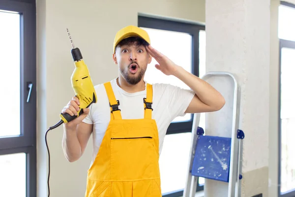 Young Handsome Man Looking Happy Astonished Surprised Handyman Drill Concept — Stock Photo, Image