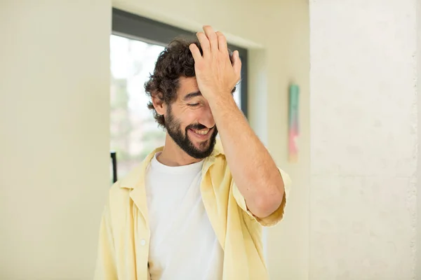 Young Crazy Bearded Man Laughing Slapping Forehead Saying Doh Forgot — Stock Photo, Image