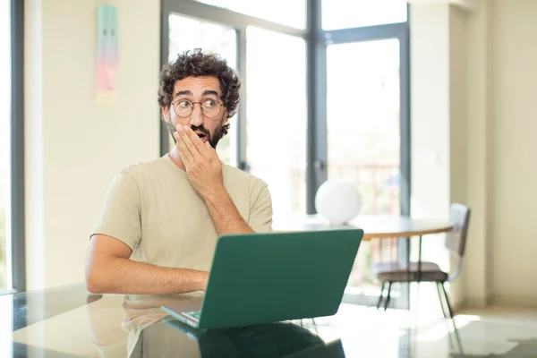 Young Adult Bearded Man Laptop Covering Mouth Hands Shocked Surprised — Stock Photo, Image
