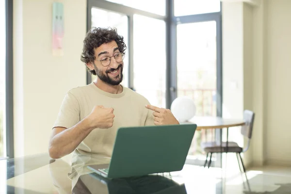 Young Adult Bearded Man Laptop Looking Happy Proud Surprised Cheerfully — Stock Photo, Image