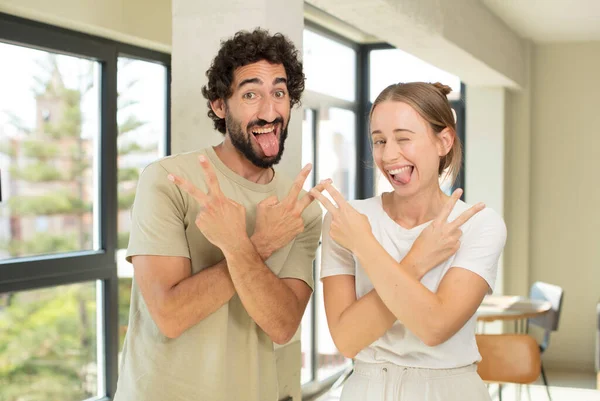 Young Adult Couple Smiling Looking Happy Friendly Satisfied Gesturing Victory — Stock Photo, Image