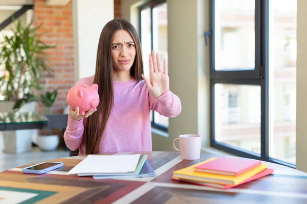 Looking Serious Showing Open Palm Making Stop Gesture Piggy Bank — Stock Photo, Image