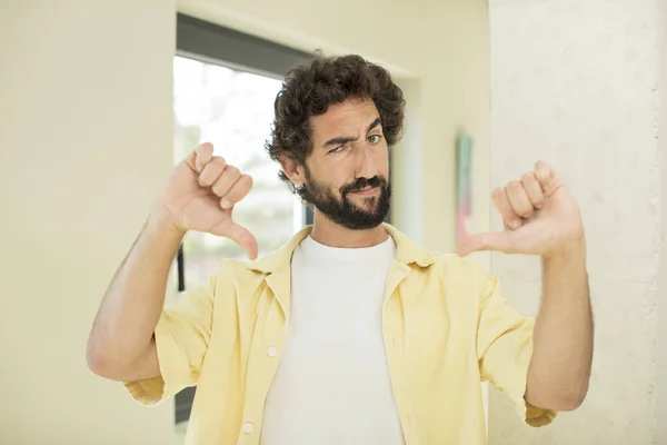 Young Crazy Bearded Man Looking Sad Disappointed Angry Showing Thumbs — Stock Photo, Image