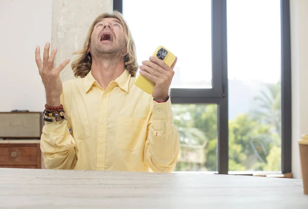 Young Adult Caucasian Man Screaming Hands Air Smart Phone Concept — Stock Photo, Image