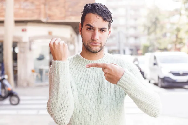 Young Hispanic Man Looking Impatient Angry Pointing Watch Asking Punctuality — Stock Photo, Image