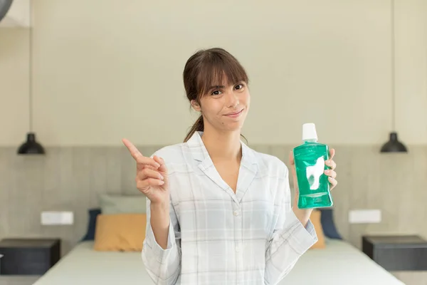 Young Pretty Woman Smiling Cheerfully Feeling Happy Pointing Side Mouthwash — Stock Photo, Image