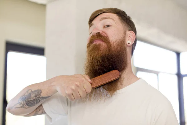 young bearded man beard cut concept