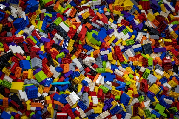 Colorful plastic brick toys in a pit