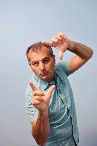 Man Showing His Fingers Front His Head — Stock Photo, Image