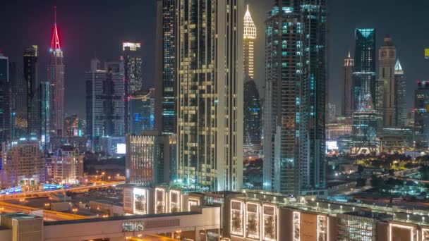 Földi Óra Fények Bekapcsolásával Towers Körül Sheikh Zayed Road Difc — Stock videók