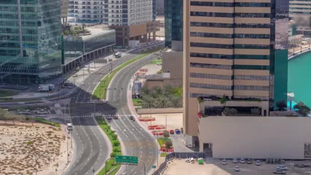Dubai Distrito Bahía Negocios Con Rascacielos Oficinas Tráfico Intersección Carreteras — Vídeo de stock