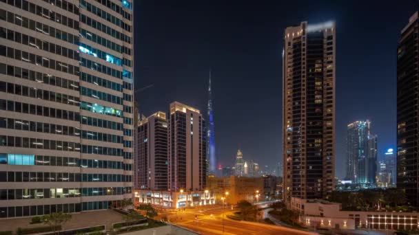 从空中俯瞰迪拜市中心的全景 到繁忙的摩天大楼 通宵通宵穿梭在商业区的交汇处 开灯关机 — 图库视频影像