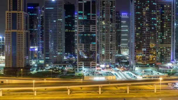 Luchtfoto Van Jumeirah Lakes Towers Met Verlichte Wolkenkrabbers Tijdens Alle — Stockvideo