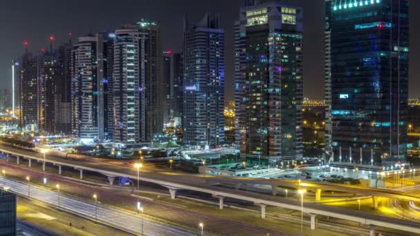 Luchtfoto Van Jumeirah Meren Torens Met Verlichte Wolkenkrabbers Tijdens Hele — Stockvideo