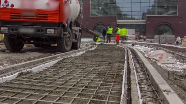 Pouring Ready Mixed Concrete Placing Steel Grid Reinforcement Make Road — Stock Video