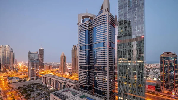 Légi Kilátás Dubai Nemzetközi Pénzügyi Körzet Sok Felhőkarcolók Éjjel Nappal — Stock Fotó