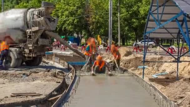 Concrete Leveling Works Road Construction Many Workers Uniform Excavators Mixer — ストック動画